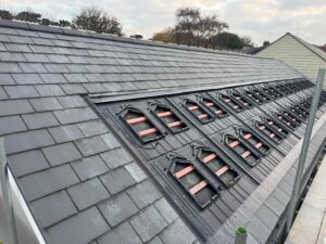 in-roof GSE trays for solar panels in Weymouth, Dorset with slate tiles.